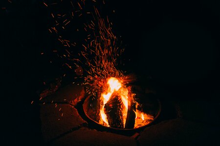 Flames burning rocks photo