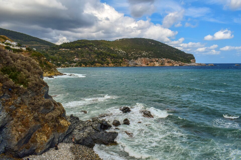 Clouds cliff wild beach