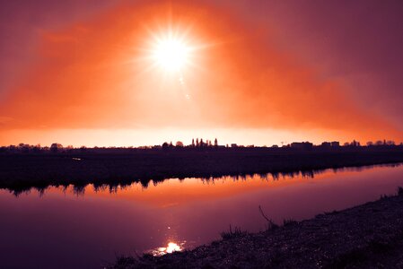 Waterway sunset skies orange skies photo