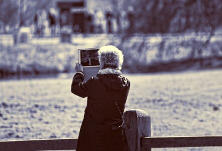 Woman shooting tablet