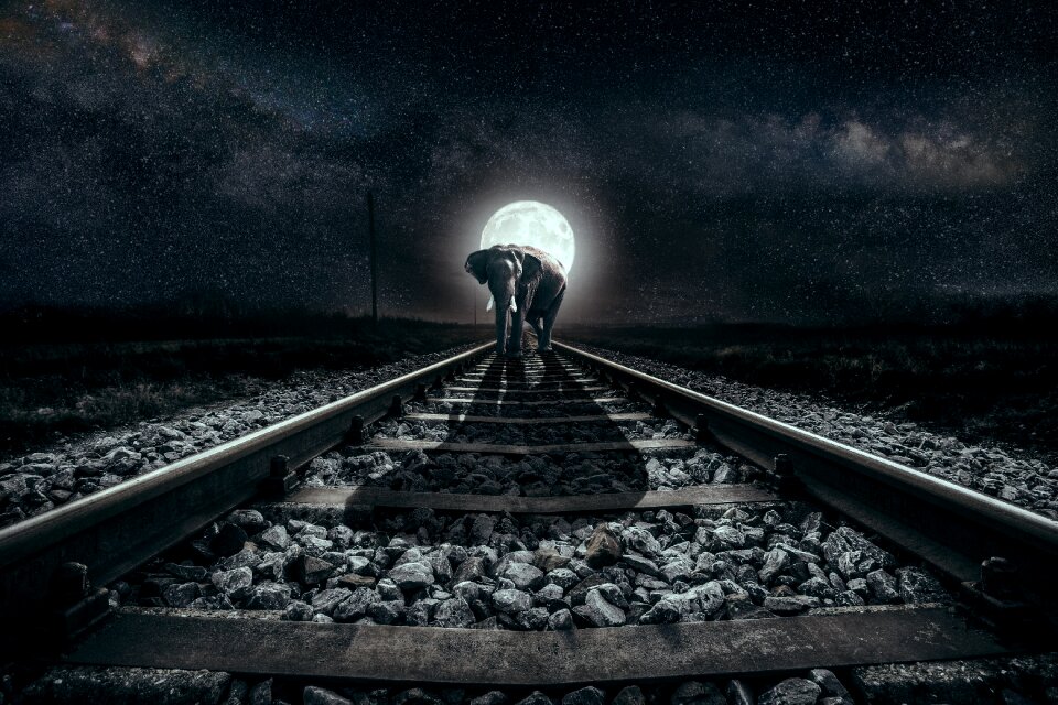 Night full moon railway rails