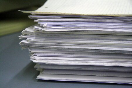 List a pile of papers office