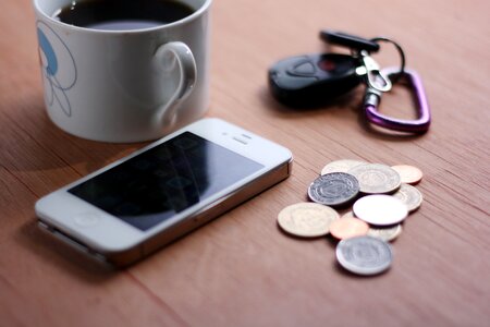 Smartphone mobile coins photo