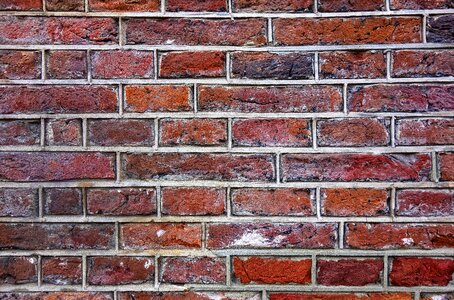 Red brick wall masonry cement photo