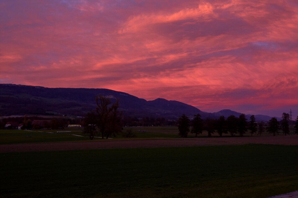 Silhouette evening sky mountains photo