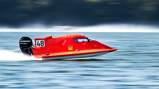 Fast racing boat water sports photo
