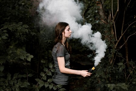 Hand bottle smoke photo