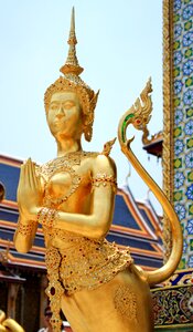 Statue temple of the emerald buddha thailand photo