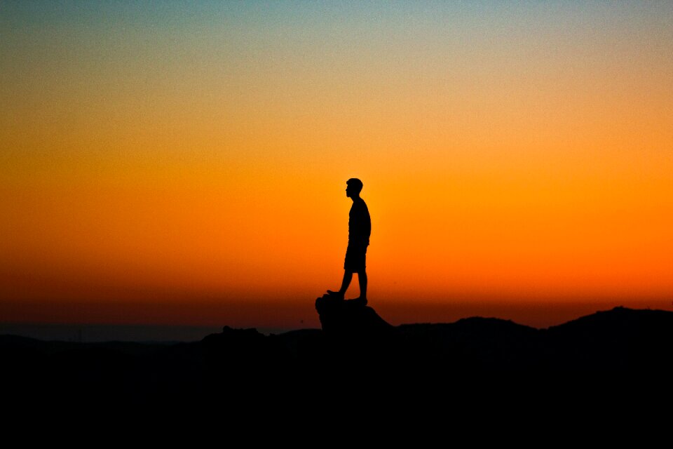 Boy golden hour sky
