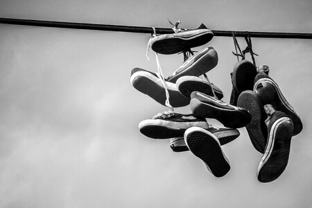 Sneakers hang shoelaces photo