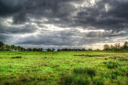 Clouds sunrays dark photo