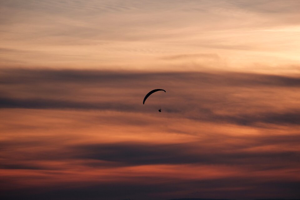 Silhouette adventure parasailing