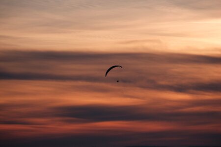Silhouette adventure parasailing