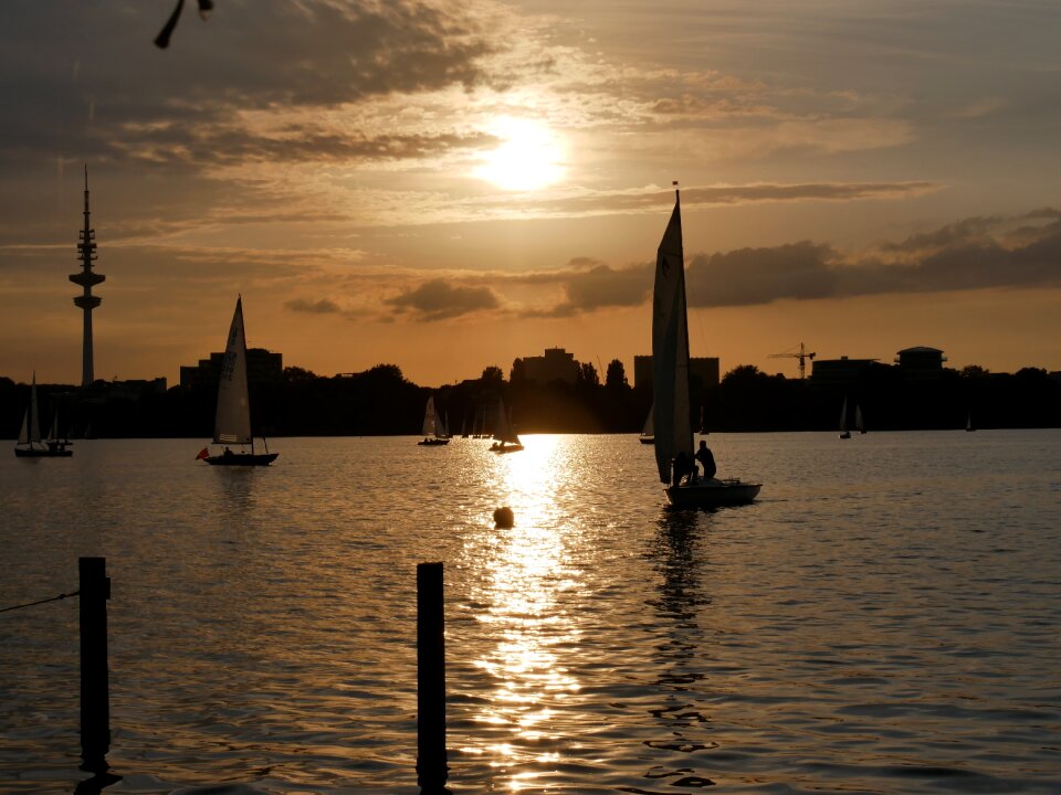 Sailing boats water light reflections