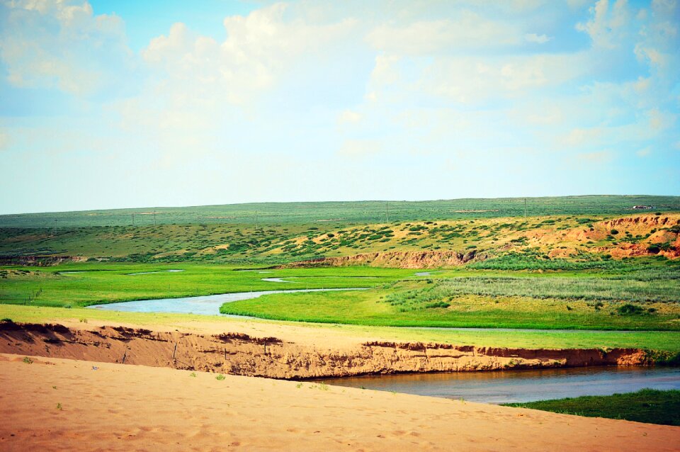 Gol playing in the sand river