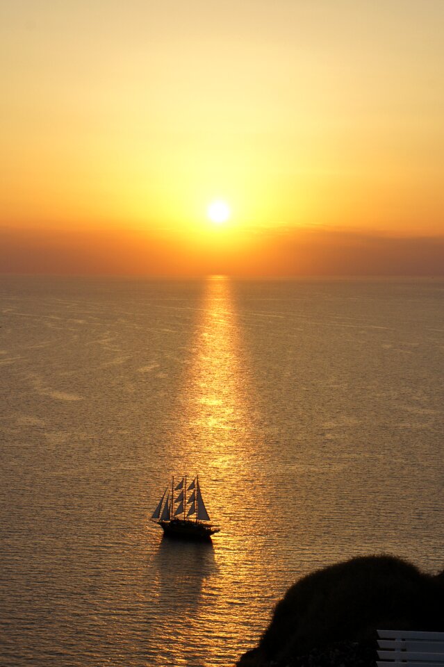 Santorini sunset ship photo