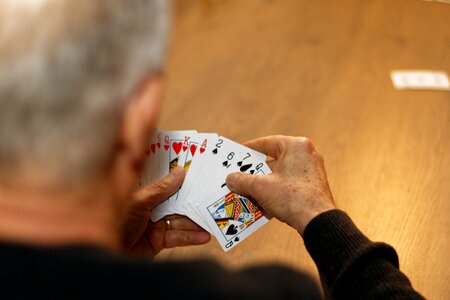 Hand playing cardgame