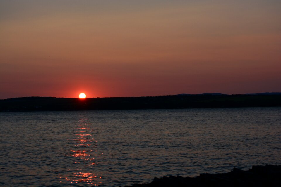 Body of water dawn twilight