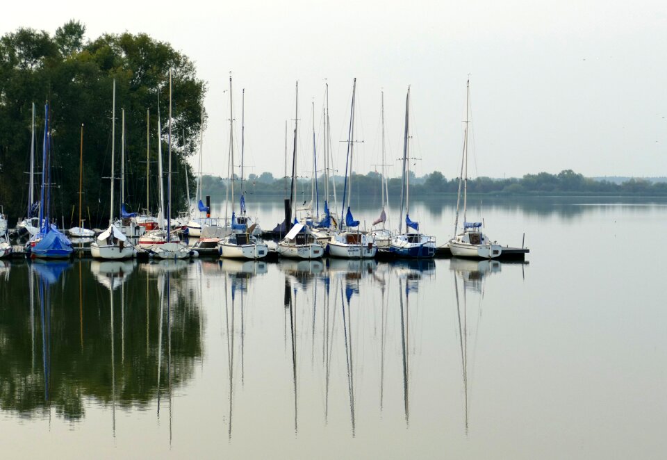Boats mirroring water