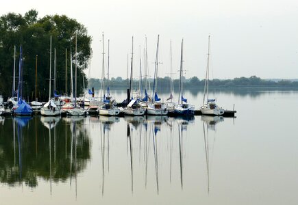 Boats mirroring water