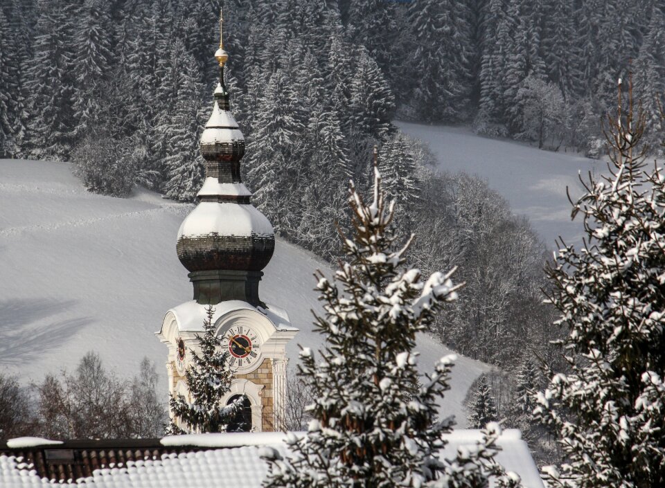Church tower watch the alps