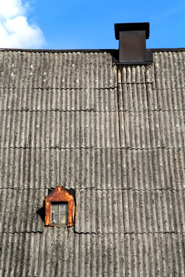 Chimney the roof of the tile