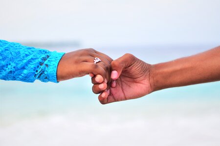 Woman man holding hands photo