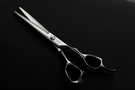 Hairdressing scissors working hairdressing scissors thinning shears photo
