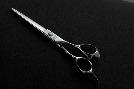 Hairdressing scissors working hairdressing scissors thinning shears photo