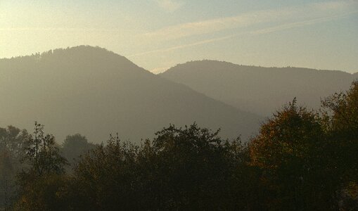 Autumn backlighting mountains photo