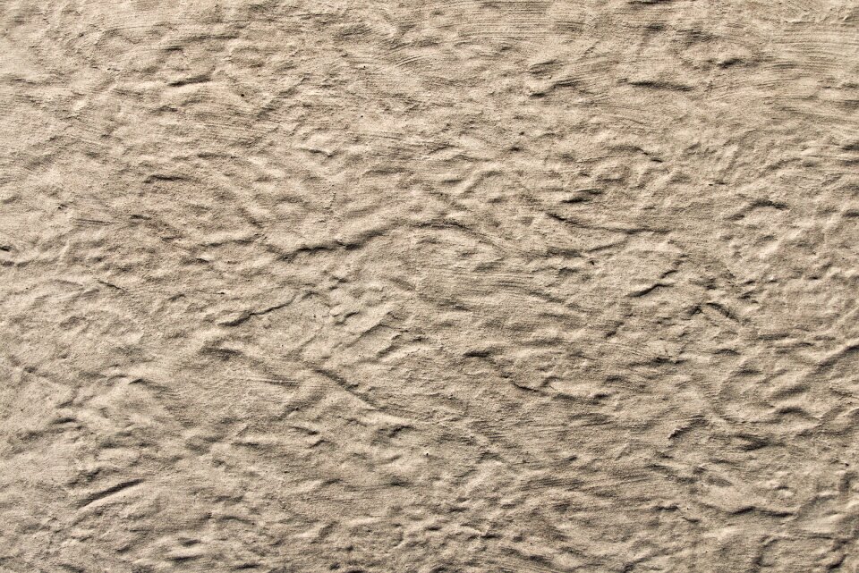 Scratch plaster textured plaster wall