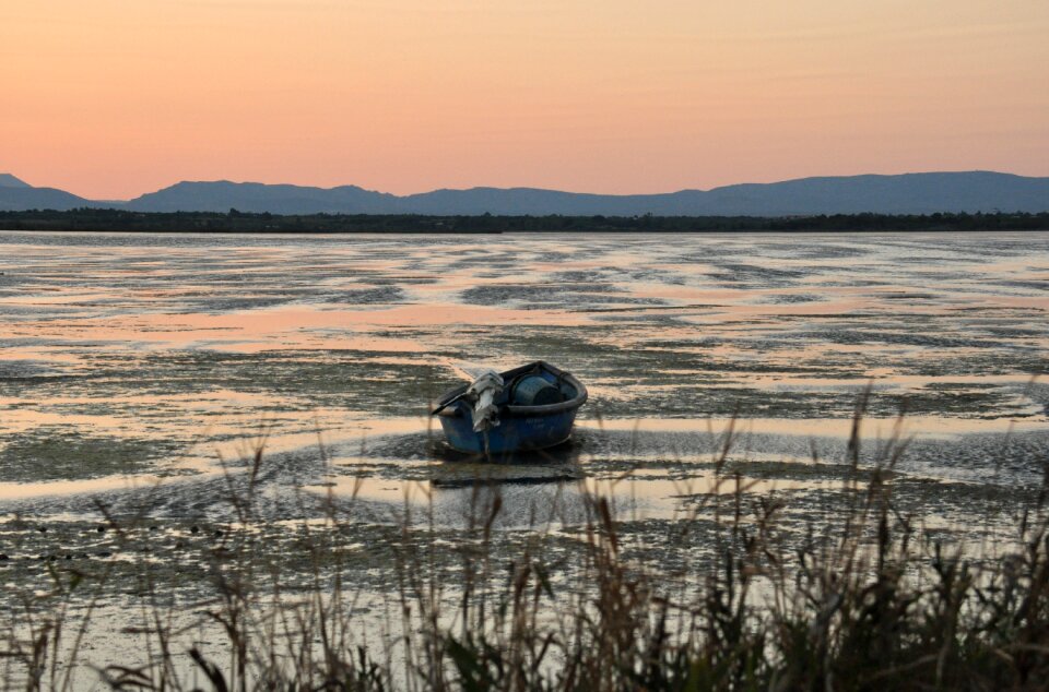 Boat pond sunset