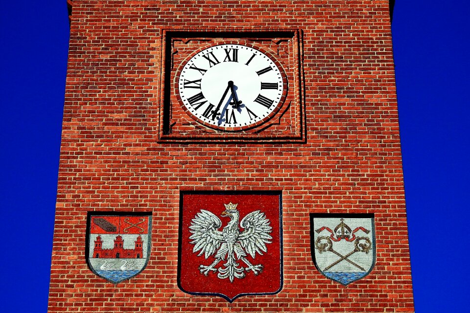 Clock clock tower coat of arms photo