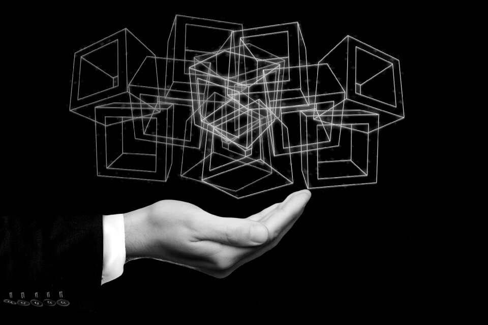 Hand holding blocks cryptographically