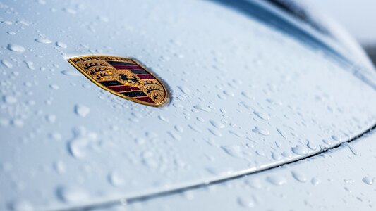 Auto car covered in snow porsche