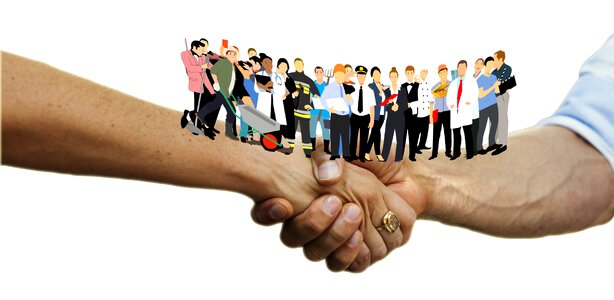 Businessmen shaking hands cooperation photo
