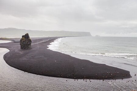 Ocean greyness partly cloudy photo