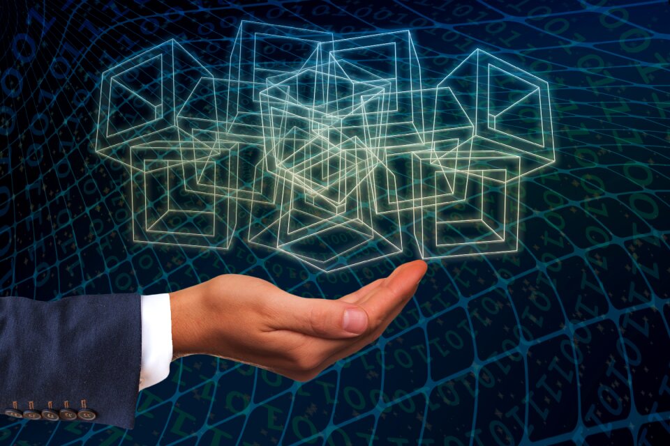 Hand holding blocks cryptographically