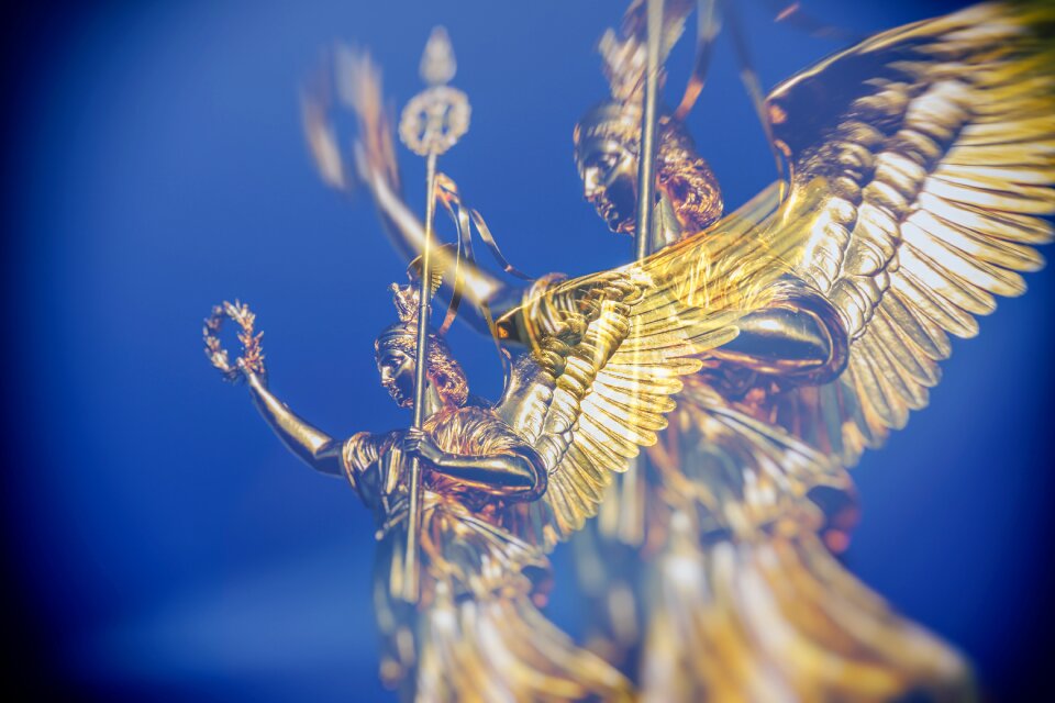 Gold else double exposure statue