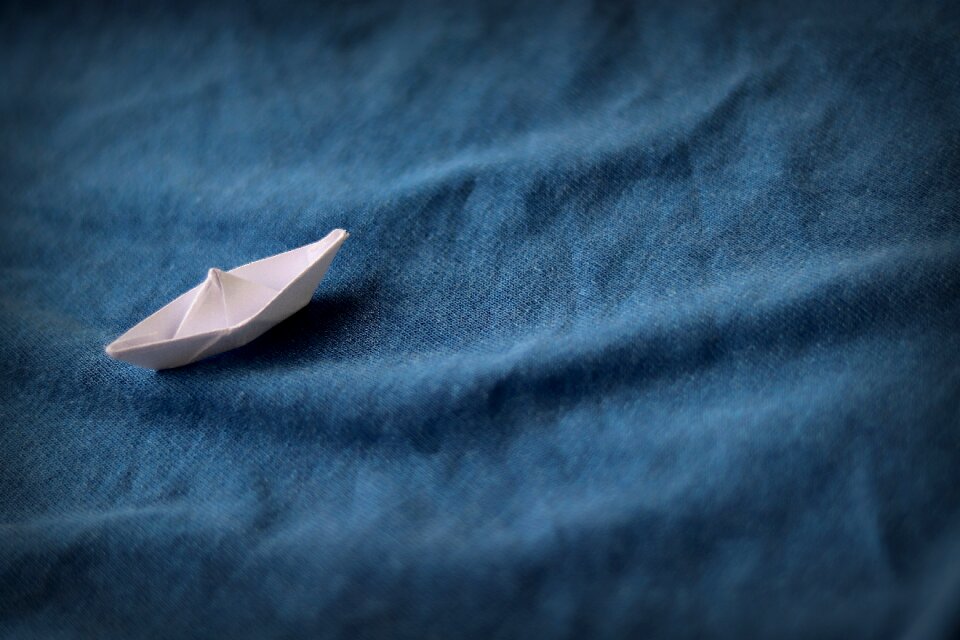 Blue map small boat
