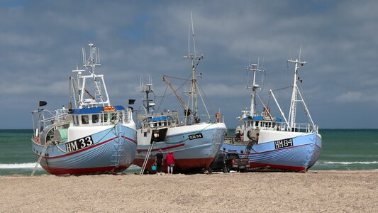 Fishing boat culture beach photo