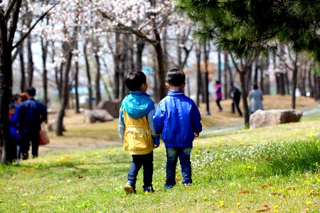 Children grass friendship