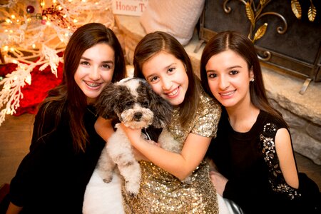 Sisters dog christmas photo