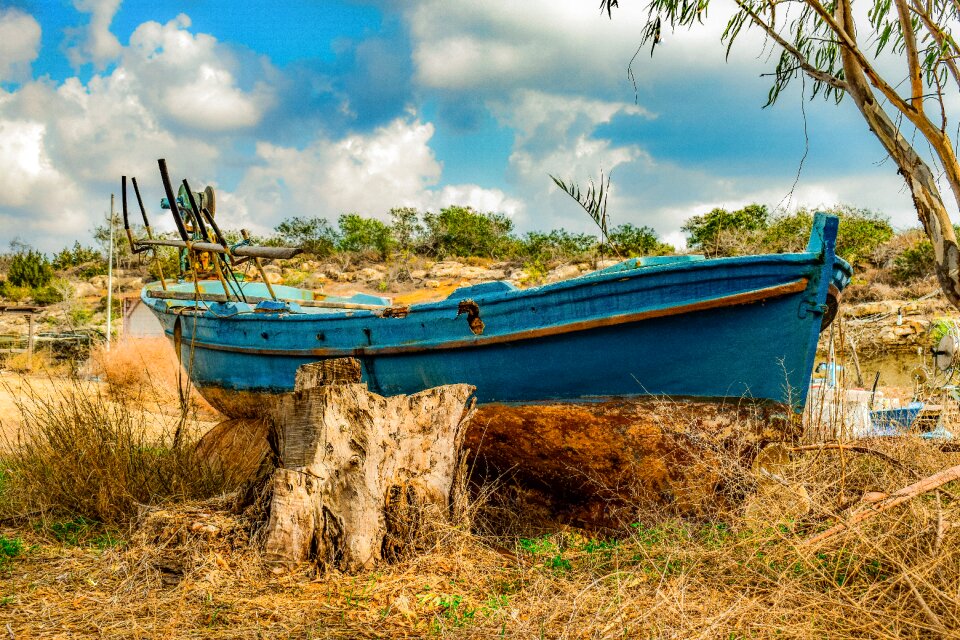 Grounded rusty abandoned