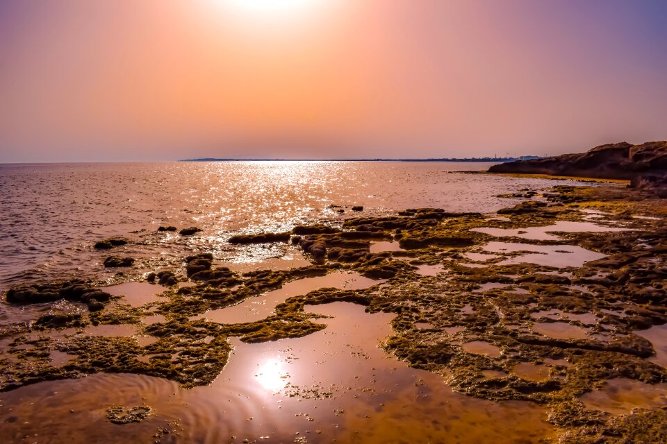 Reflections dusk seashore photo