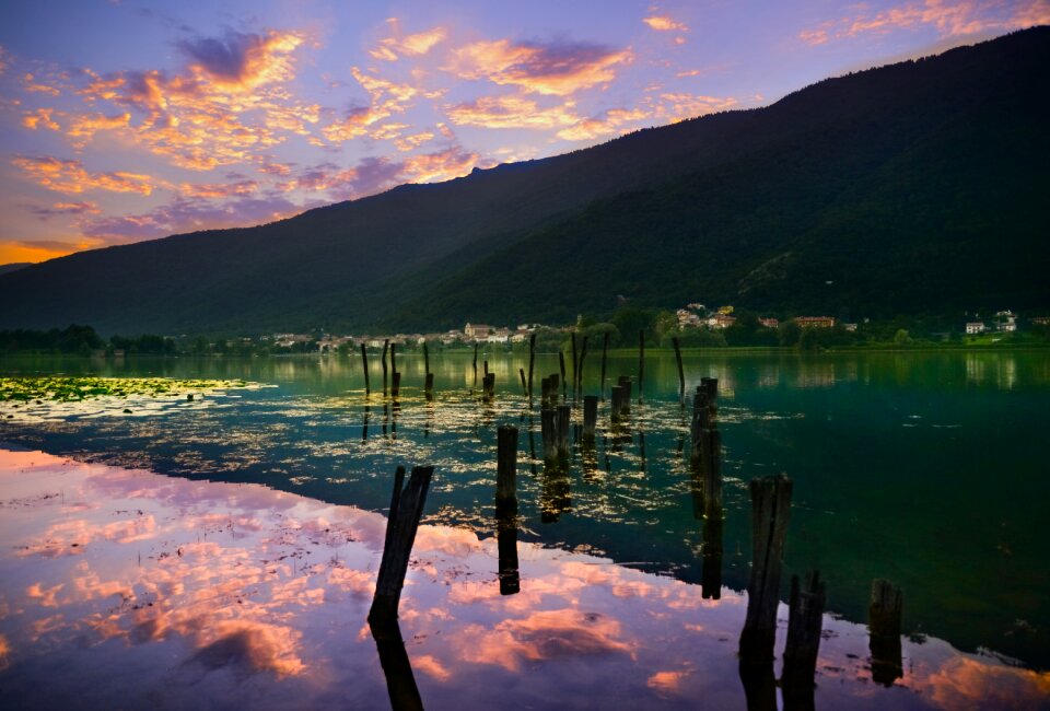 Mountains jetty reflection photo