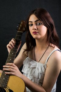 Young portrait guitarist photo