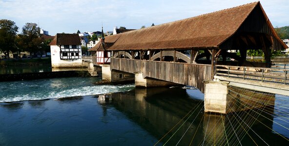 Old wooden bridge bremgarten sun