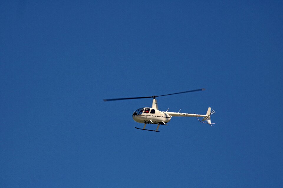 Helicopter white flying