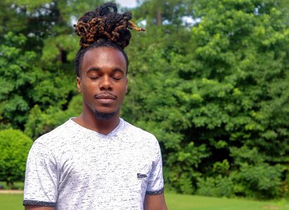 Black man young man dreads